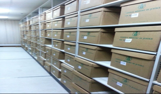Image showing archived documents in boxes.